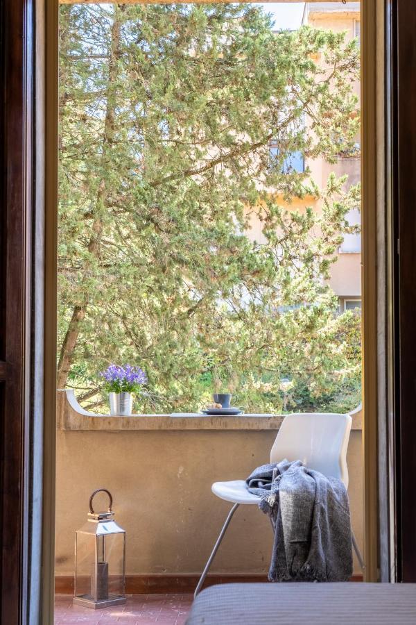 Cozy Roman Apartment With Parking 佛罗伦萨 外观 照片